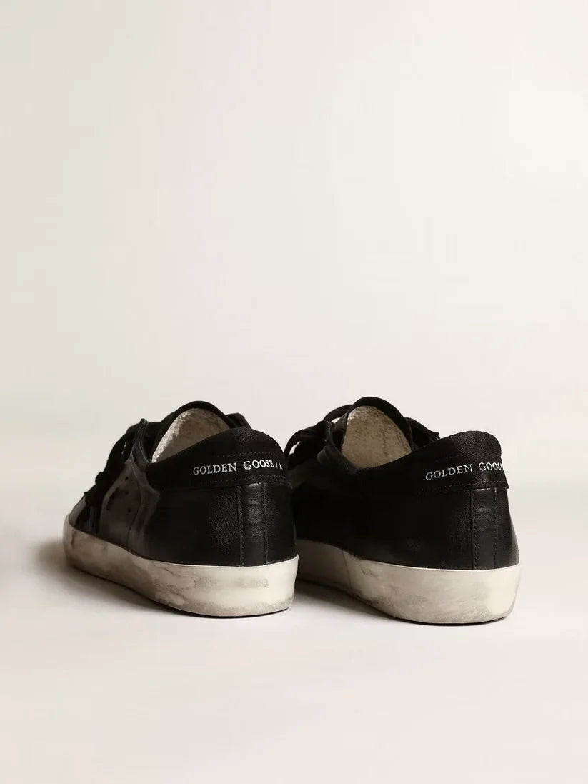 Super-Star in nappa nera con stella e talloncino in suede nero
