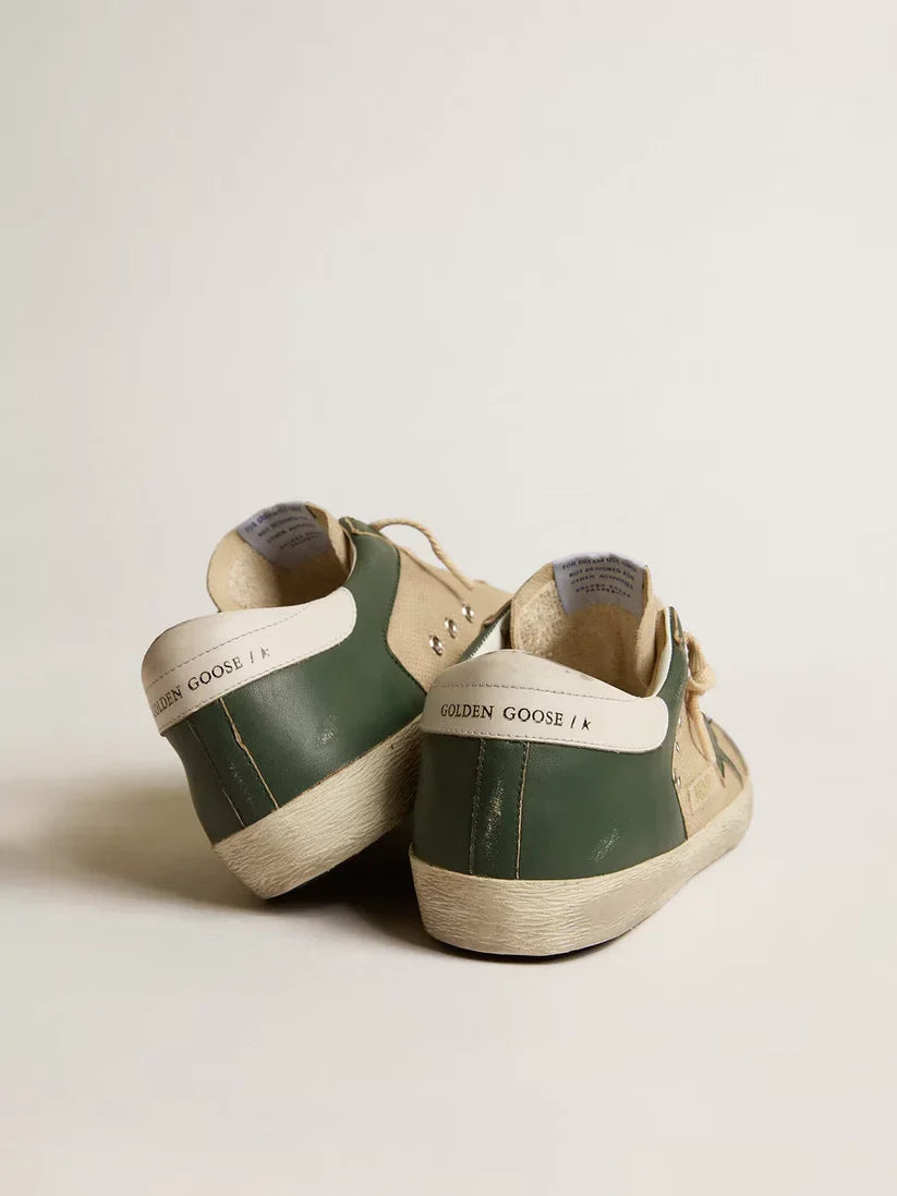 Super-Star LTD in rete panna e nappa verde con stella in nappa