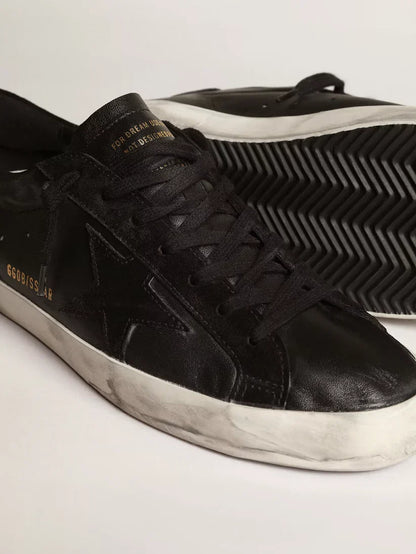 Super-Star in nappa nera con stella e talloncino in suede nero
