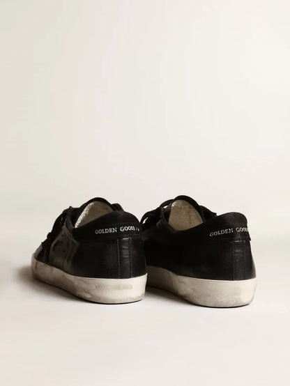 Super-Star in nappa nera con stella e talloncino in suede nero