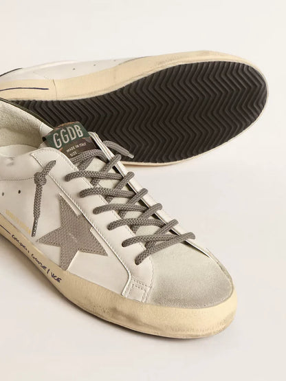 Super-Star LTD con stella stampa coccodrillo e talloncino verde