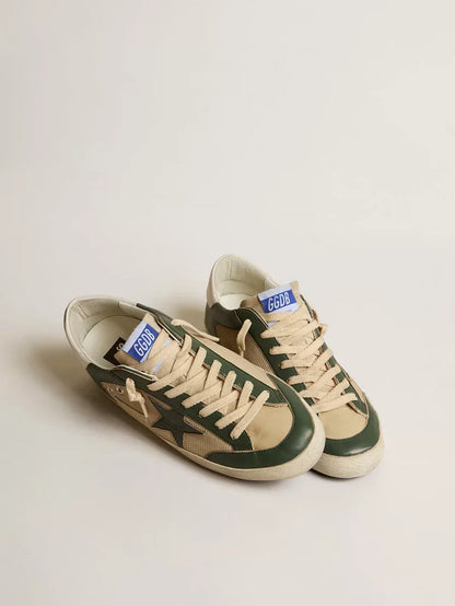 Super-Star LTD in rete panna e nappa verde con stella in nappa