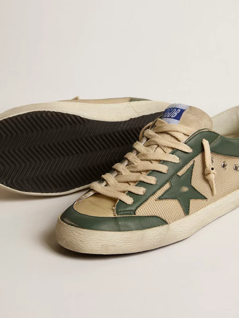 Super-Star LTD in rete panna e nappa verde con stella in nappa