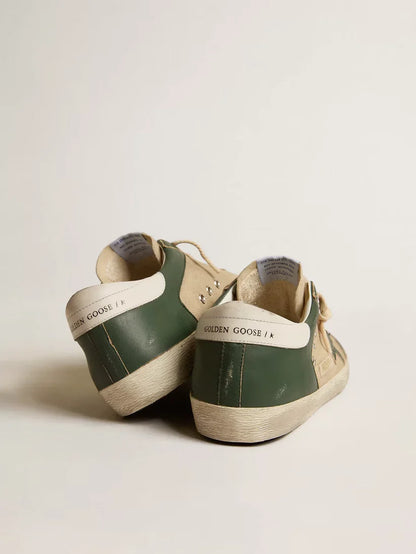 Super-Star LTD in rete panna e nappa verde con stella in nappa